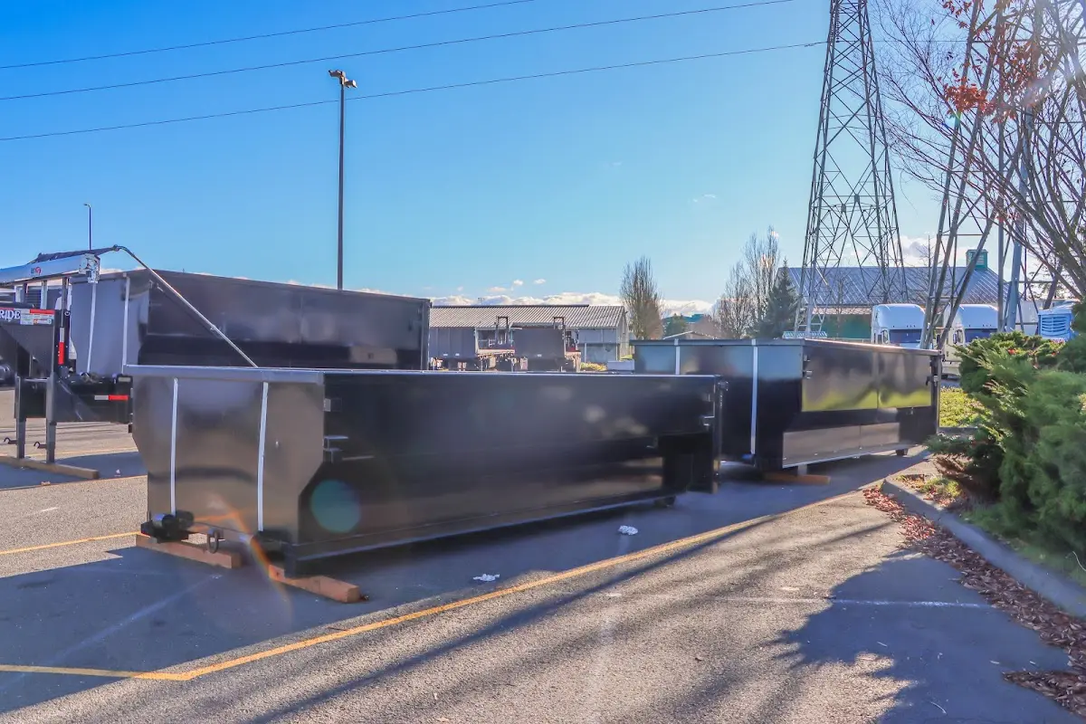 Roll-off dumpster ready for waste disposal at job site for 2 Yard Dumpster Rental in Cumberland